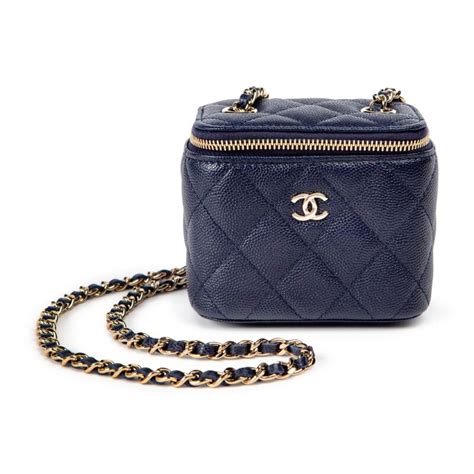 chanel camellia vanity with chain|Long vanity with chain, Grained calfskin & gold.